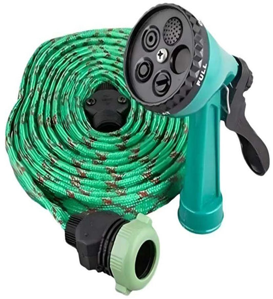 A green 4-in-1 water spray gun attached to a hose, with adjustable nozzles and a long hose coiled around it.