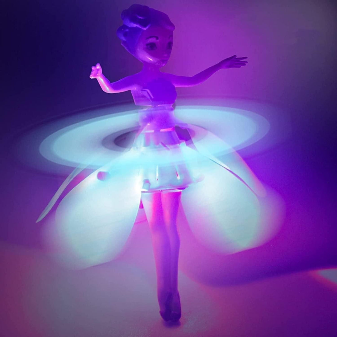 Toy figure with glowing skirt on a dark background