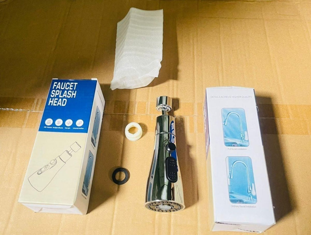 Faucet splash head with packaging and accessories on a wooden surface