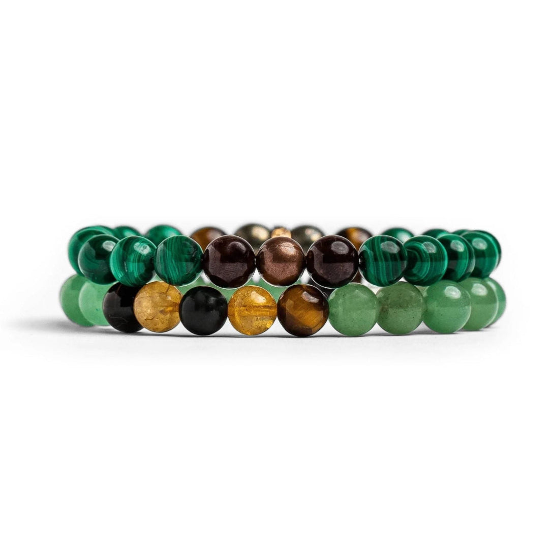 Set of three beaded bracelets with green, brown, and gold stones on a white background