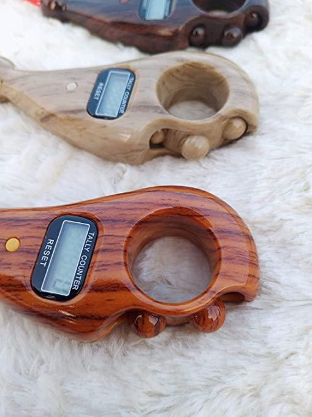 Wooden digital counter on a white fur background