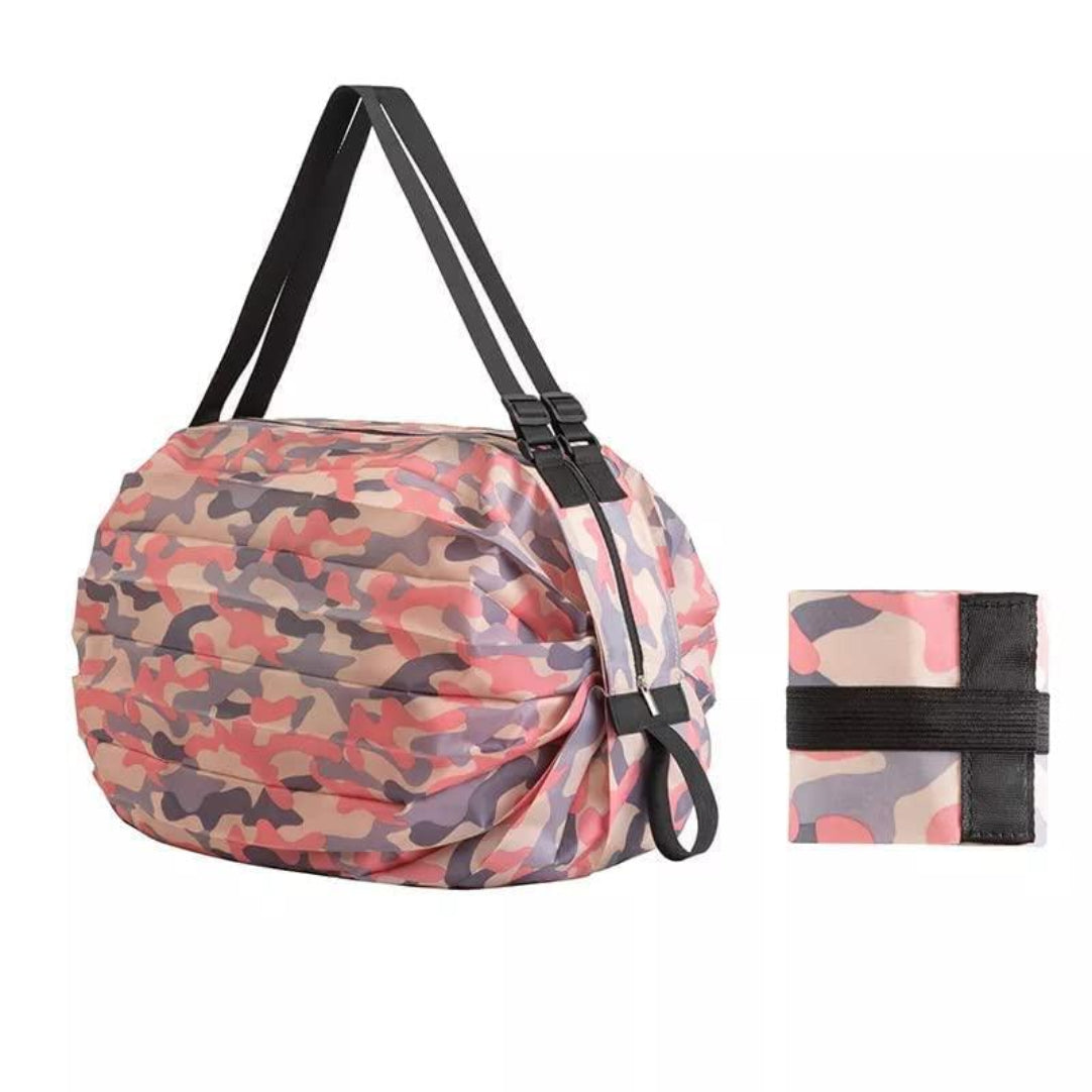 Camouflage-patterned bag and smaller roll-up item on a white background