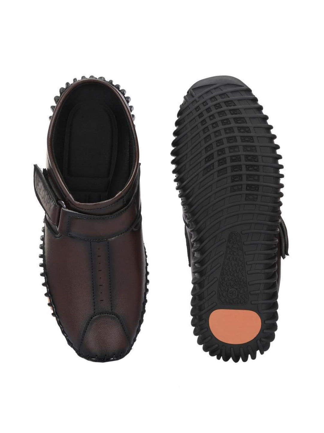 Brown shoe with black sole on a white background