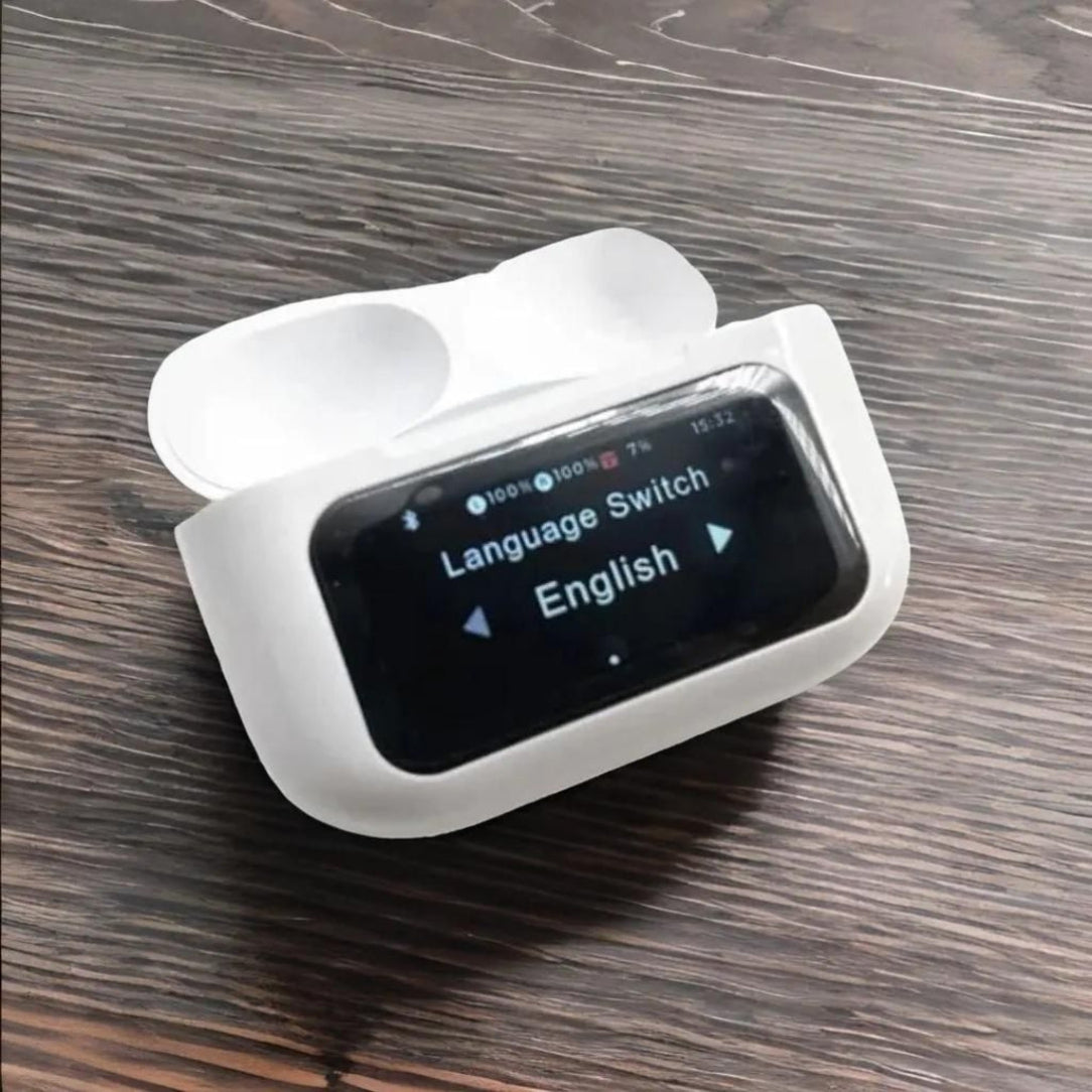 White electronic device with a screen displaying language settings on a wooden surface