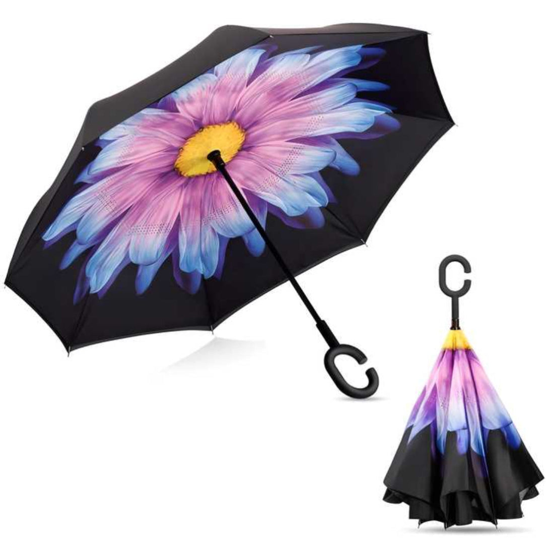 Inverted umbrella with a colorful flower design on a white background