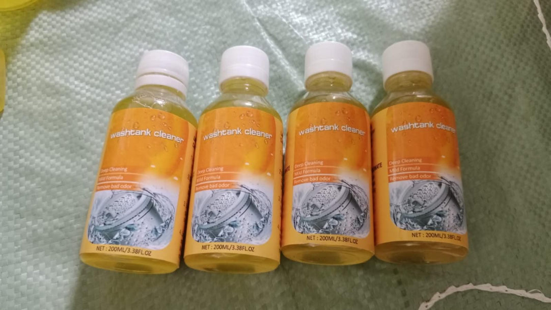 Four bottles of 'whitening cleaner' on a textured surface