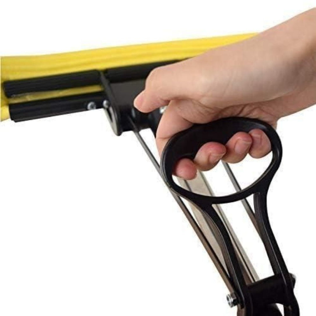 Hand holding a black and yellow squeegee against a white background