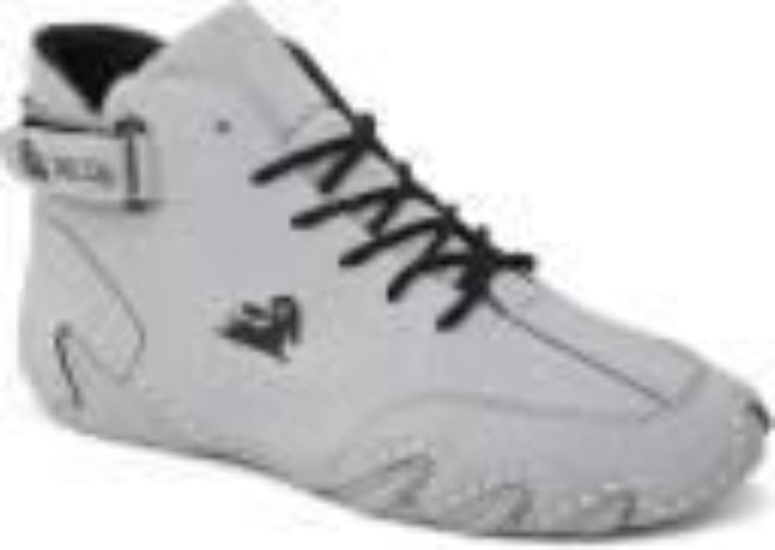 Gray high-top sneaker with black laces on a white background