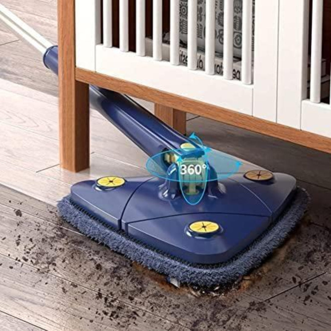Blue floor cleaning device under a piece of furniture on a wooden floor.