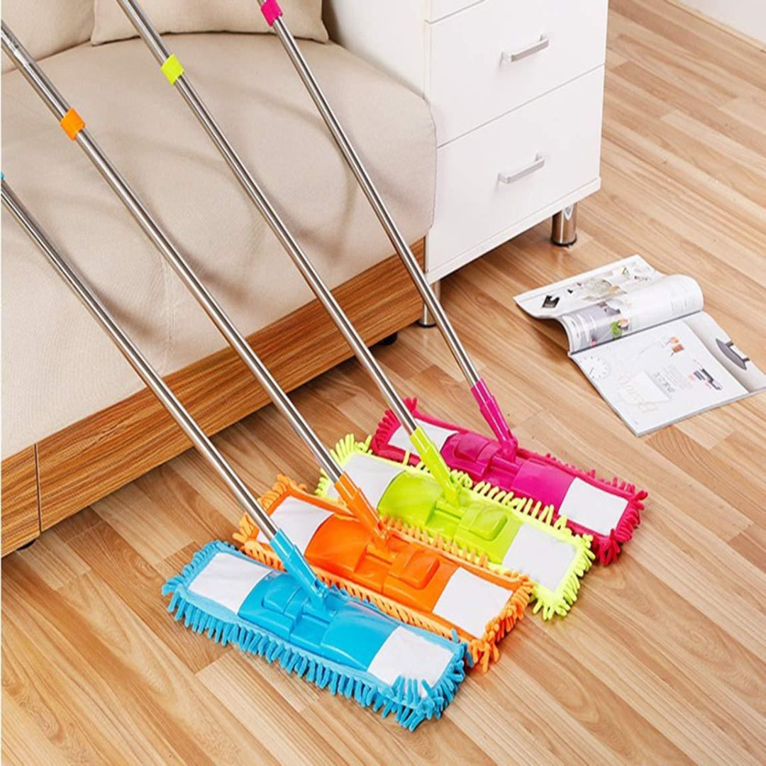 Colorful dust mop on a wooden floor with a couch and magazine in the background
