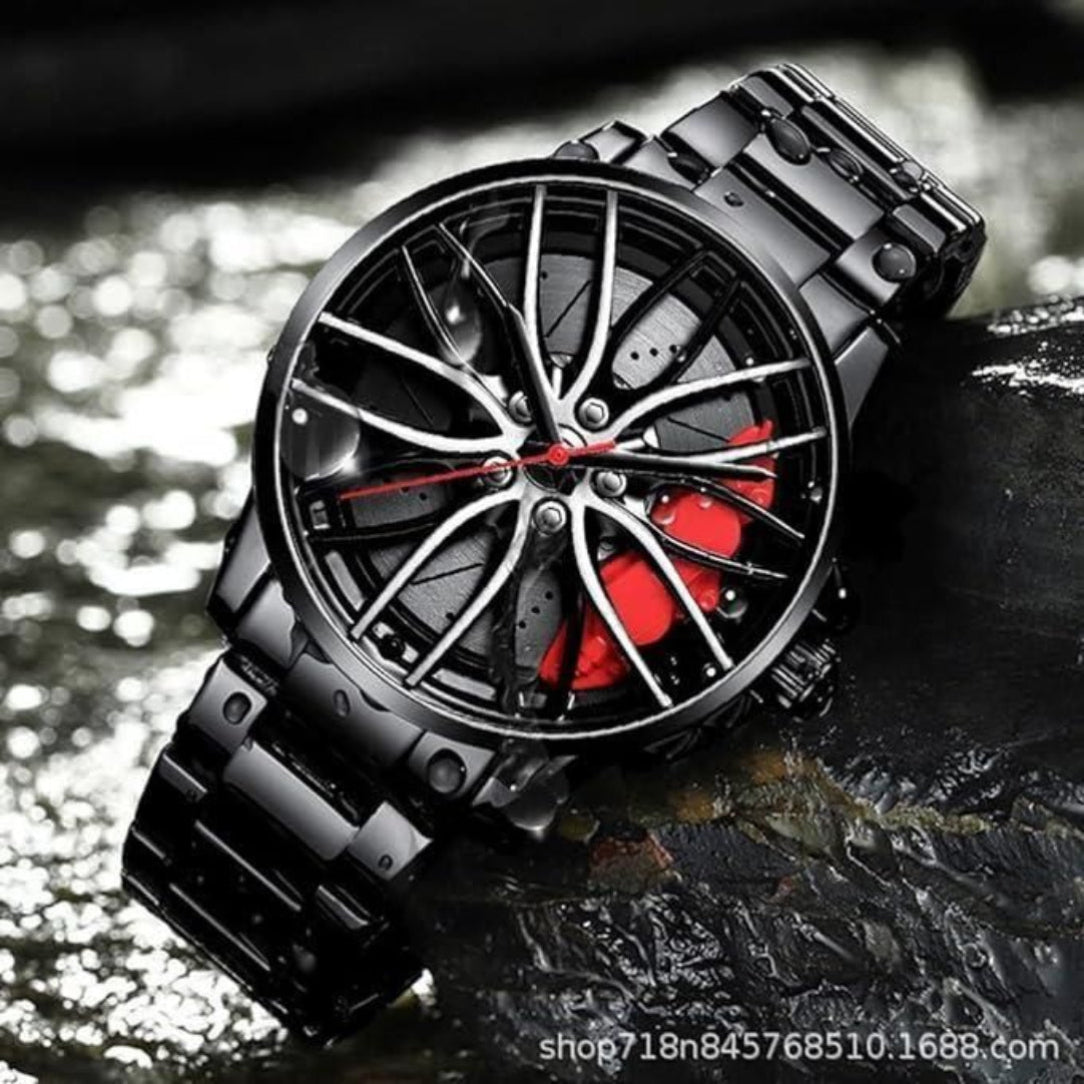 A black analog watch with a unique 3D car wheel design dial, displayed on a textured background.