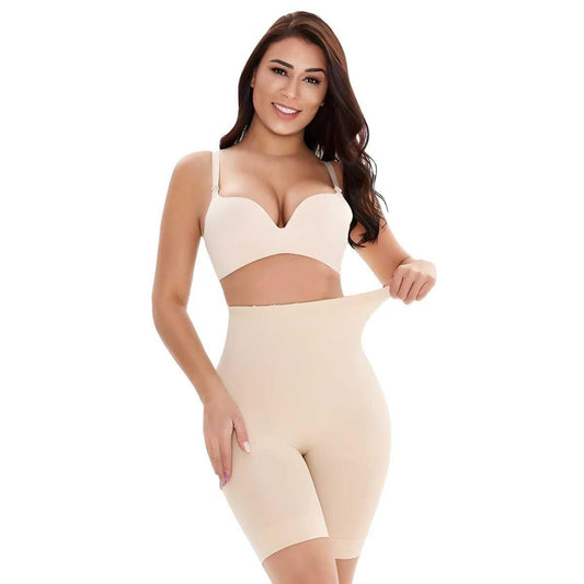 Woman wearing a beige shapewear garment on a white background