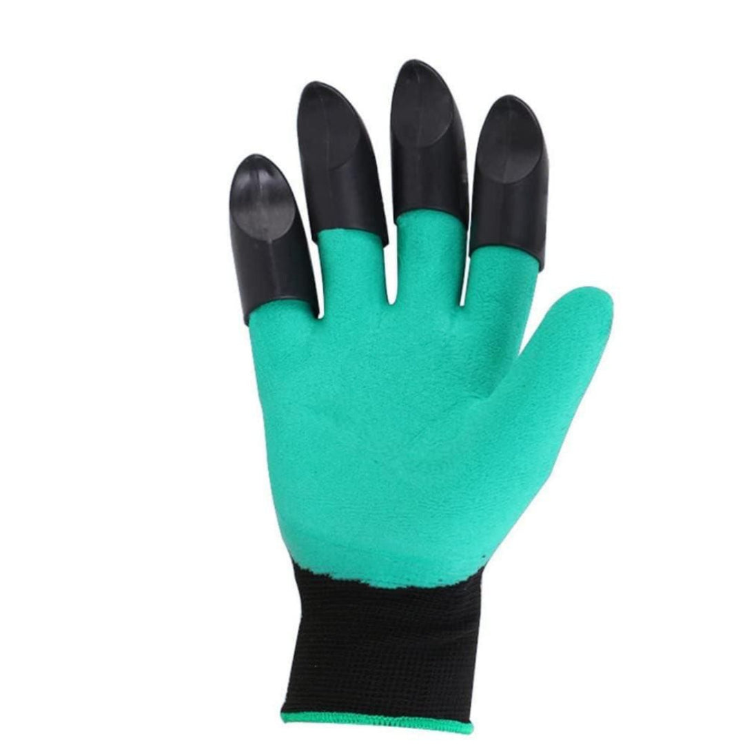 Green gardening glove with black finger tips on a white background