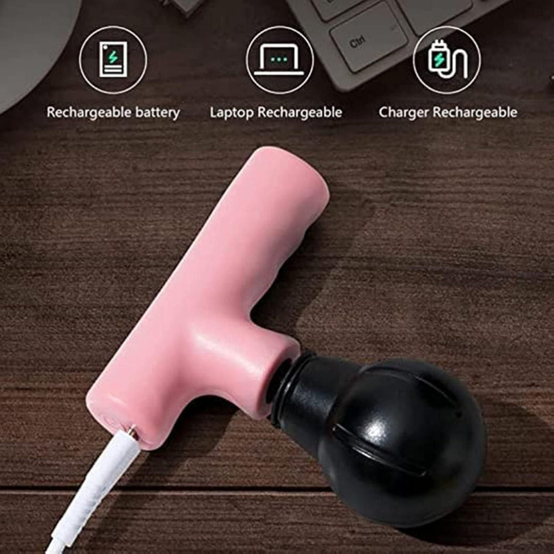 Pink and black handheld device on a wooden surface with icons and text indicating rechargeable battery, laptop rechargeable, and charger rechargeable.