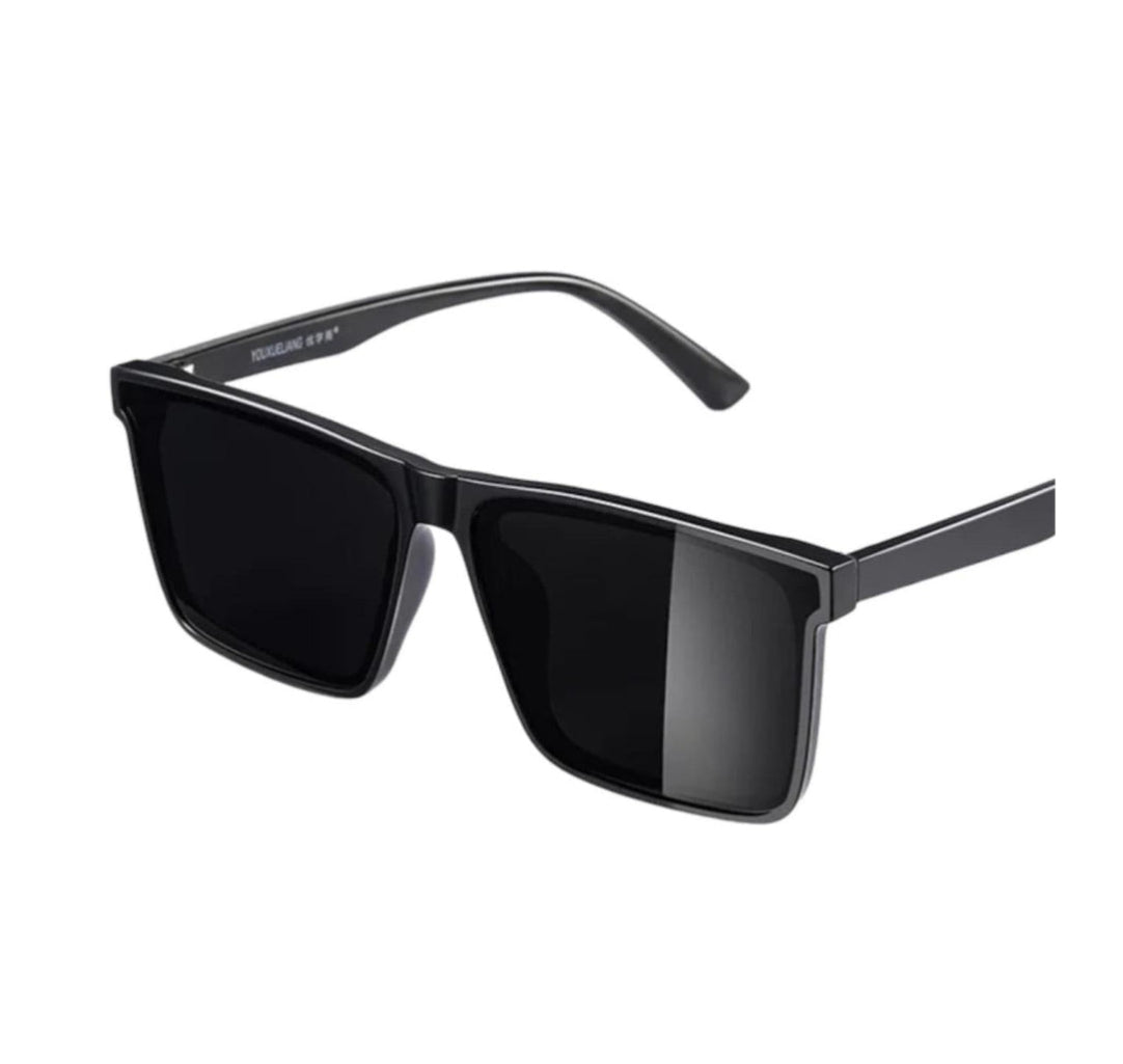 Black sunglasses with a white background