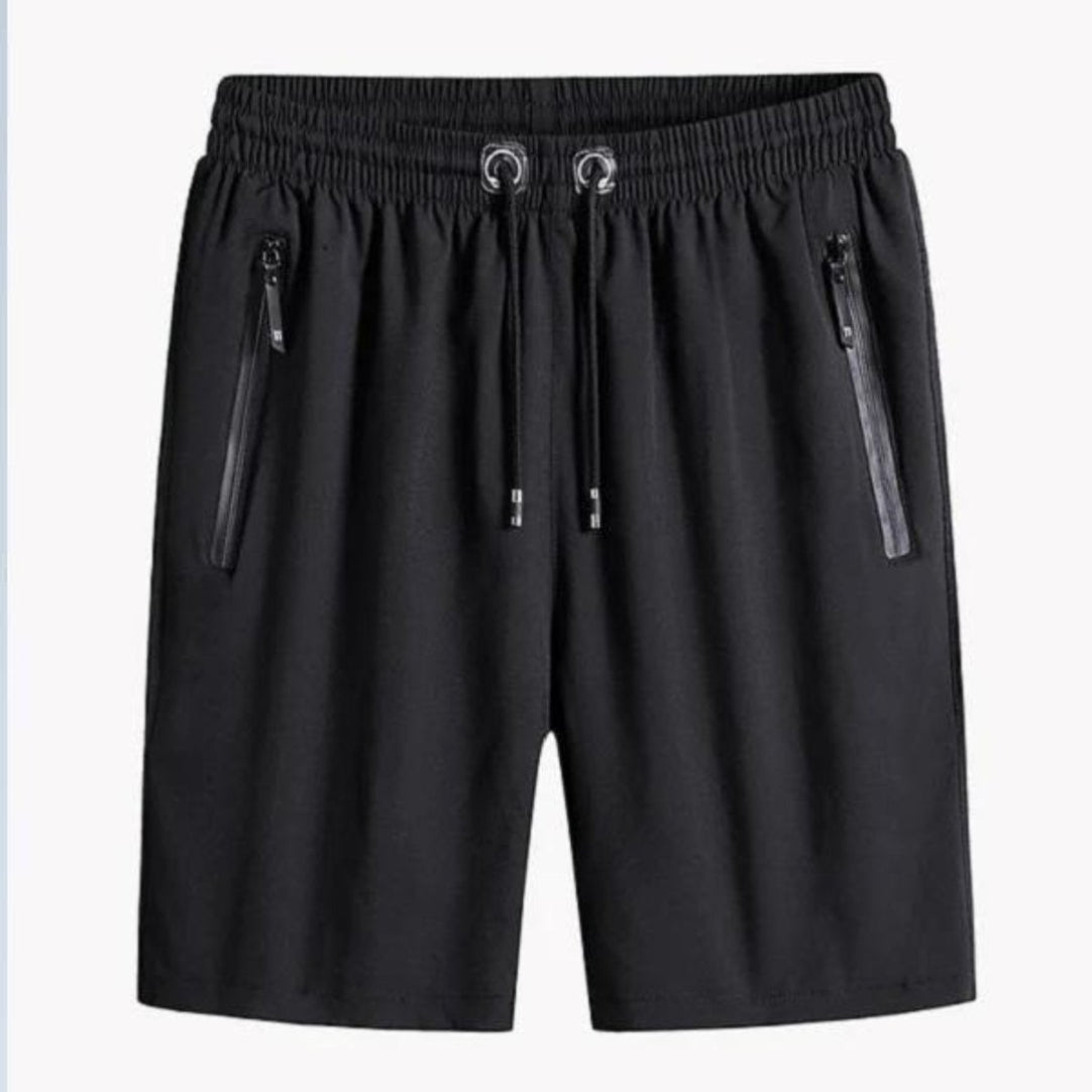 Black shorts with zippers on a white background