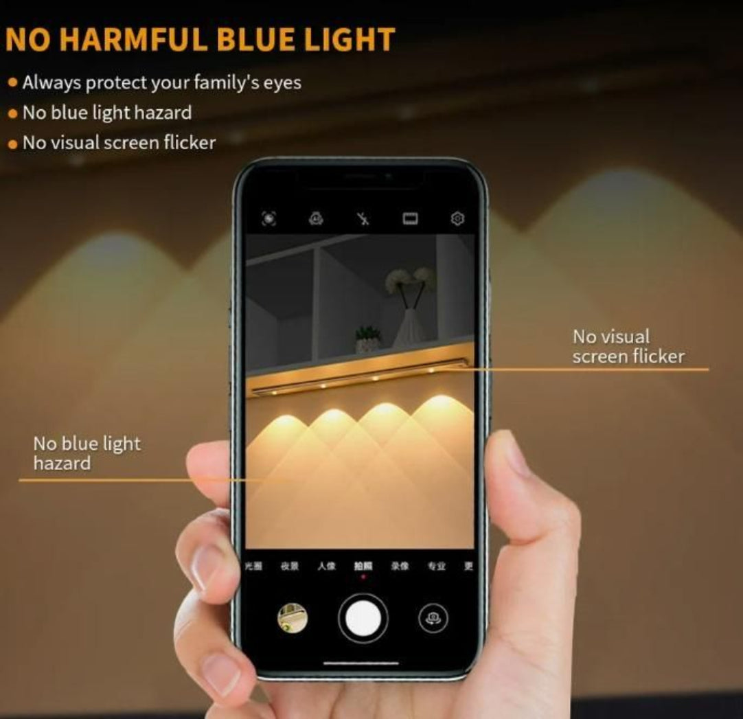Hand holding a smartphone with a screen displaying a room's interior, emphasizing blue light protection features.