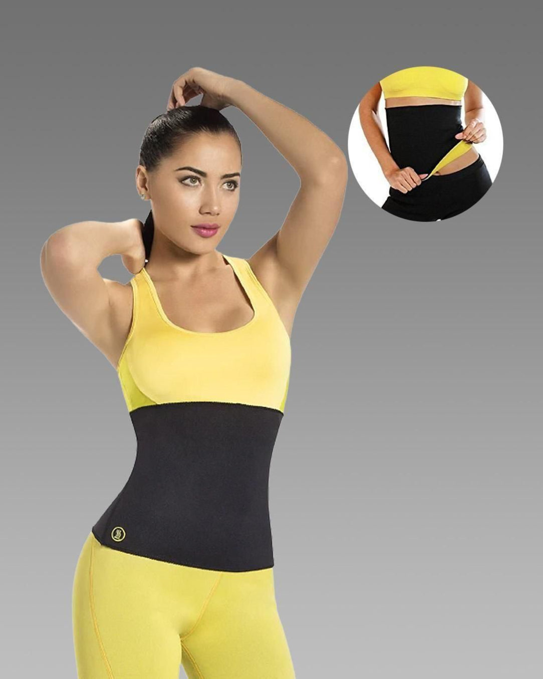 Woman wearing a black waist trainer with yellow top and pants on a gray background