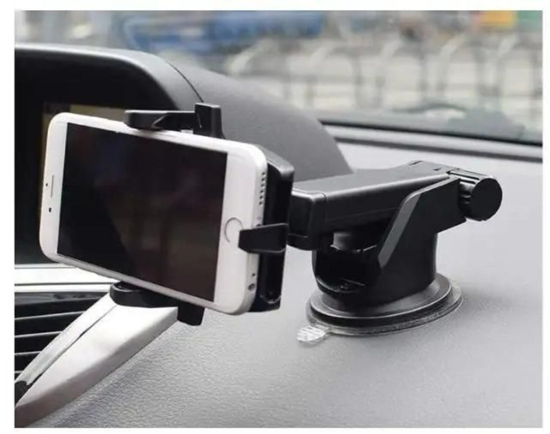 Car phone holder with smartphone on a car dashboard
