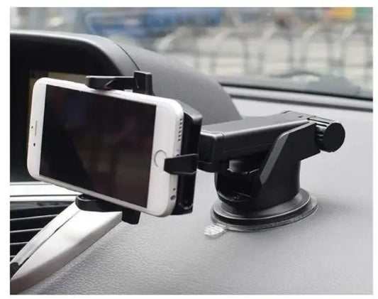 Car phone holder with smartphone on a car dashboard