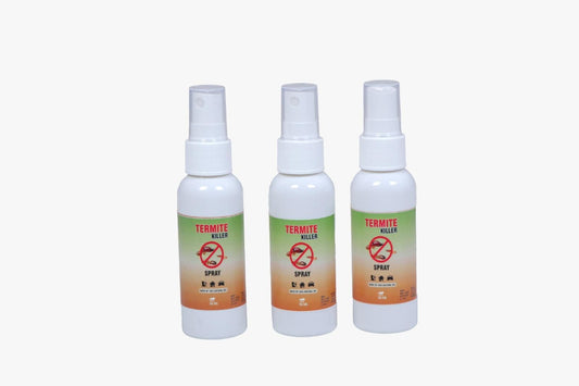 Three bottles of termite killer spray on a white background