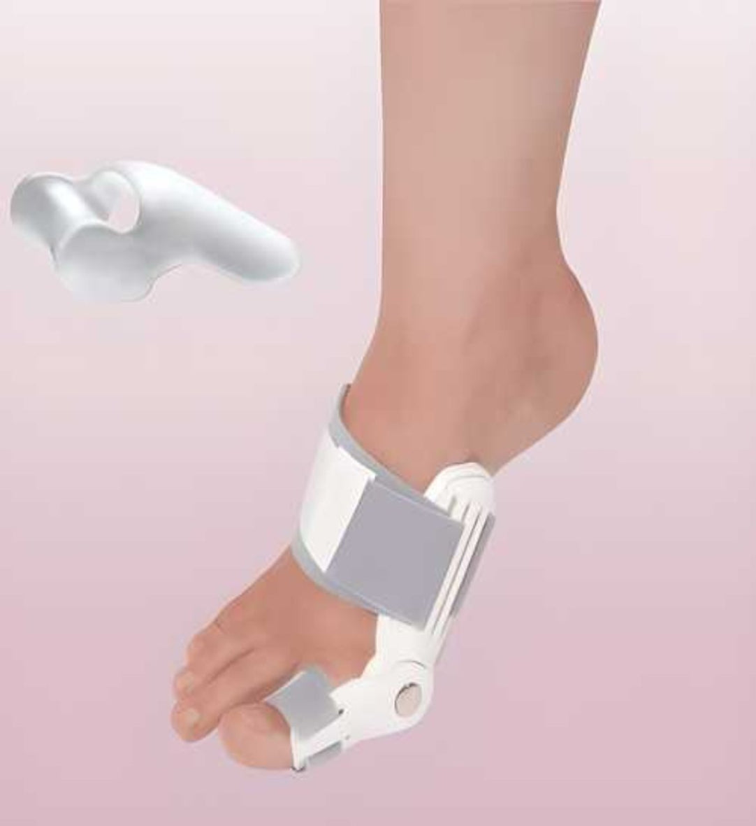 A silicone toe separator for adults, designed to correct bunions, is shown applied to a human foot. The product is white and made of silicone material with a gray hinge mechanism.