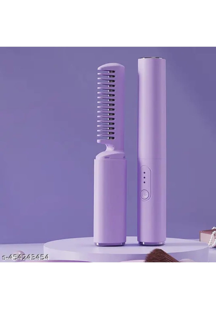 Purple hair comb and styling tool on a purple background