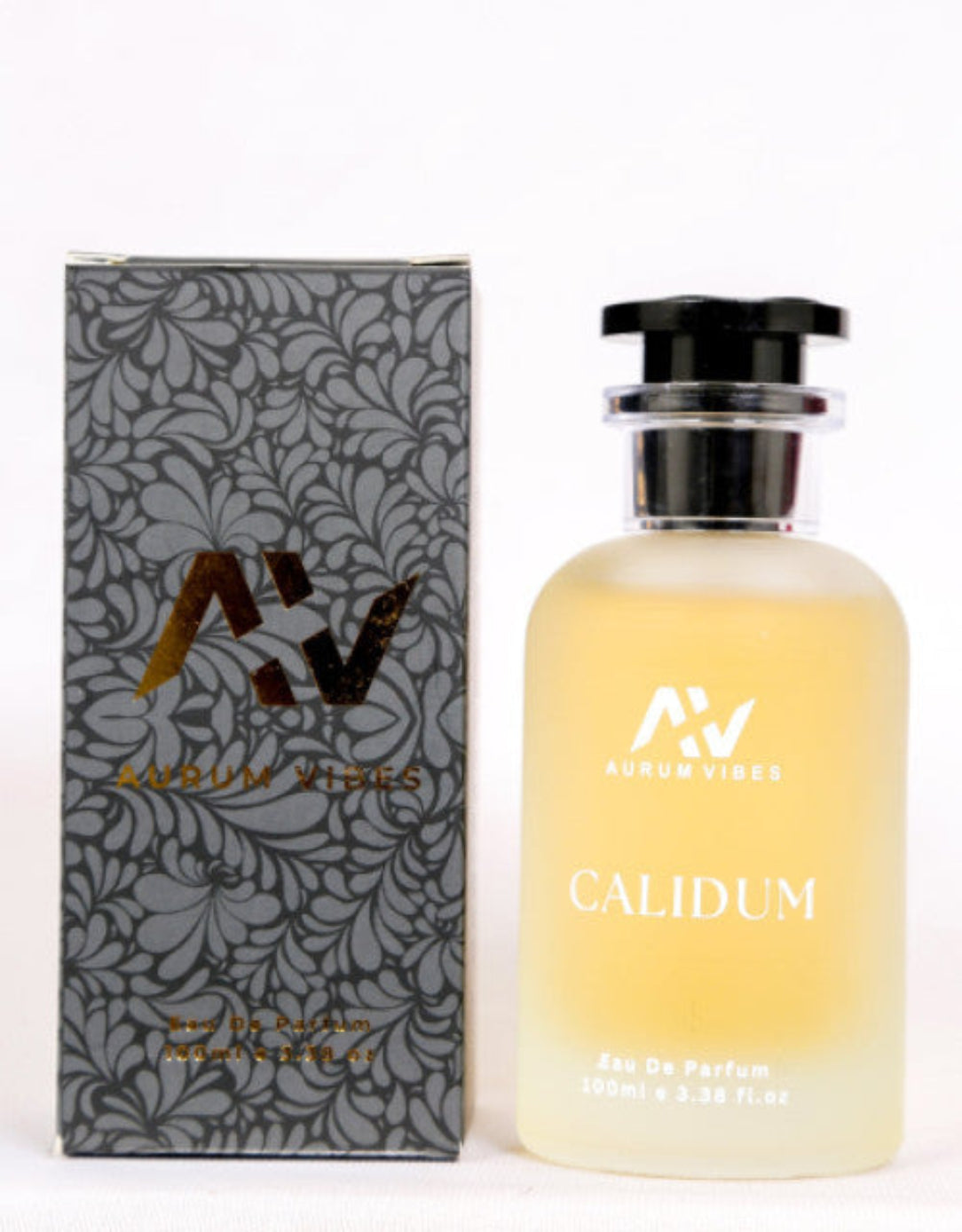 Perfume bottle and packaging with 'AV' branding on a white background