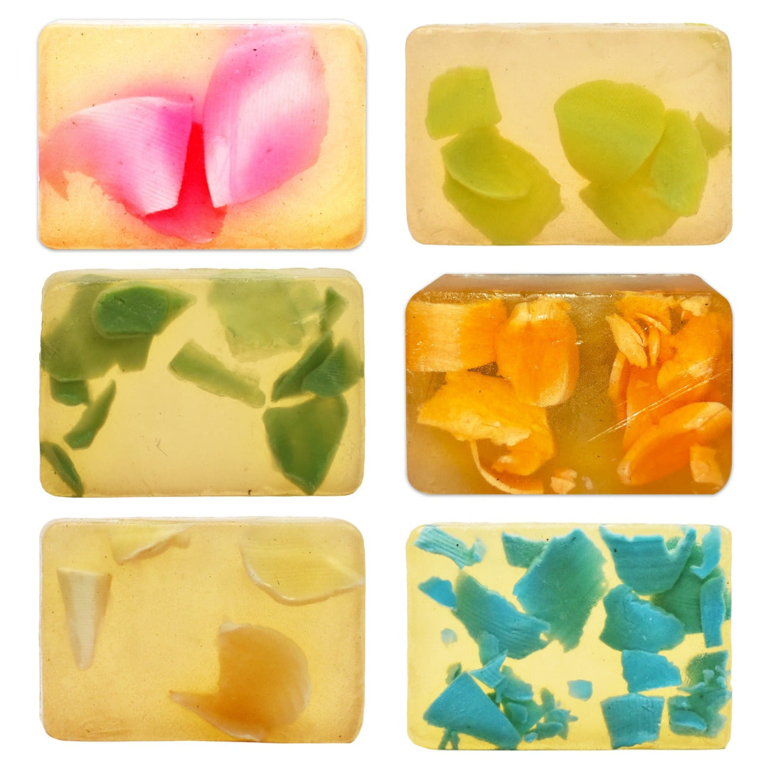 Set of six colorful soap bars with natural patterns on a white background
