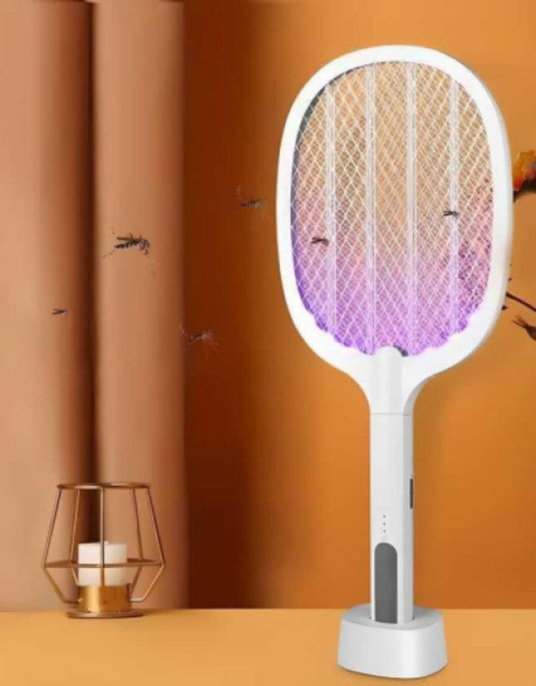 Electric fly swatter with a gradient design on an orange background