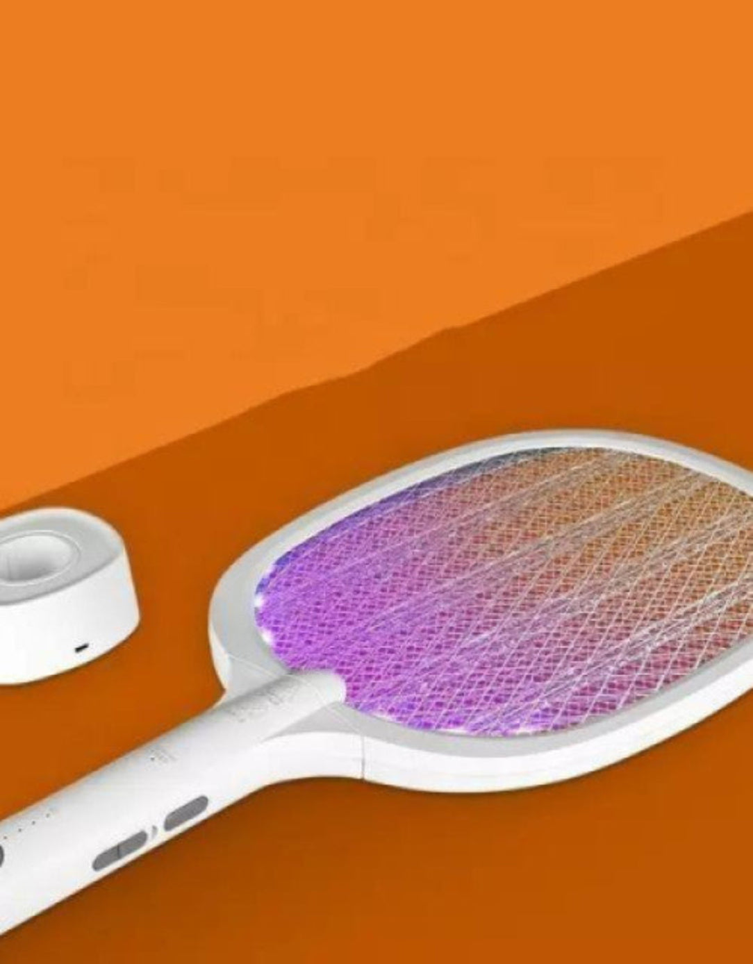 White electric fly swatter with purple mesh on an orange background