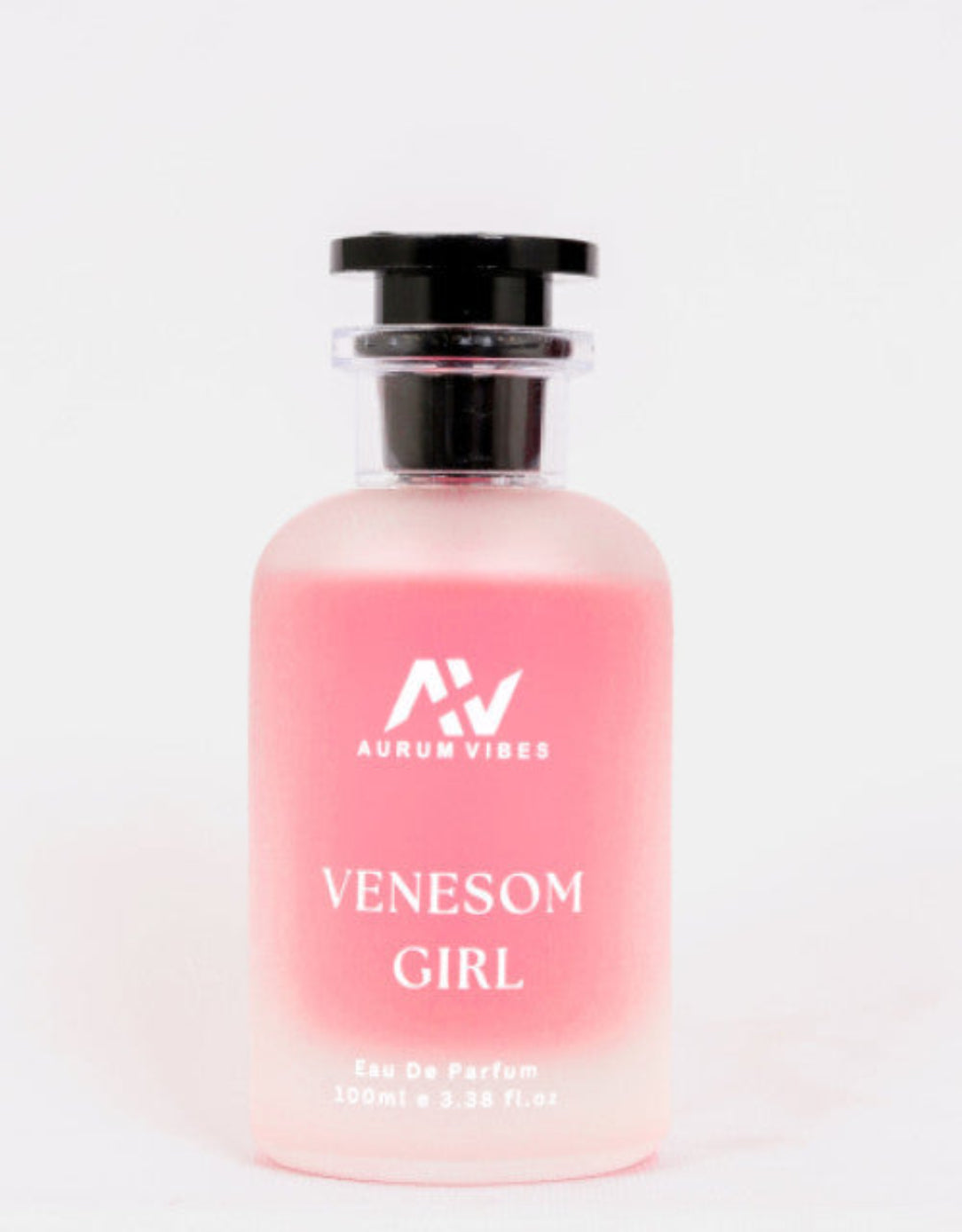 Pink perfume bottle labeled 'Venesom Girl' by Aurum Vibes on a white background