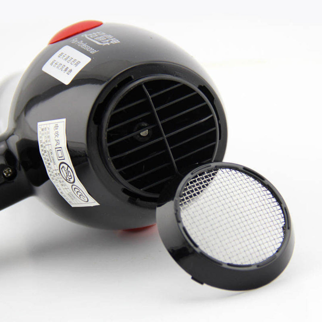 Black hair dryer with a detachable nozzle on a white background