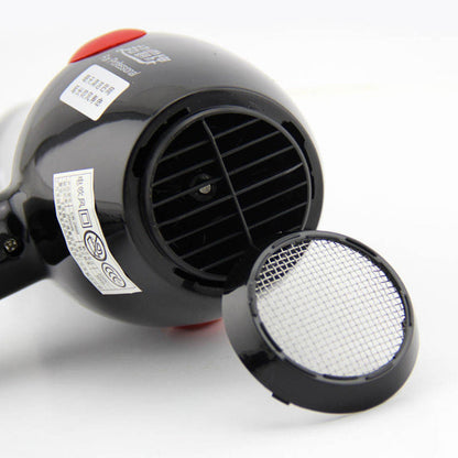 Black hair dryer with a detachable nozzle on a white background