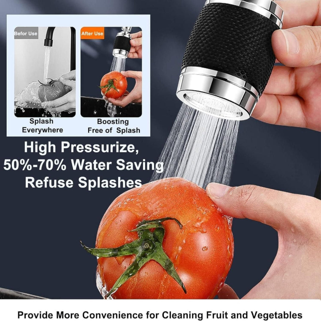Hand holding a water faucet nozzle with a tomato being rinsed, showcasing water saving feature.