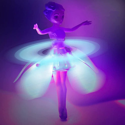 Toy figure with glowing skirt on a dark background