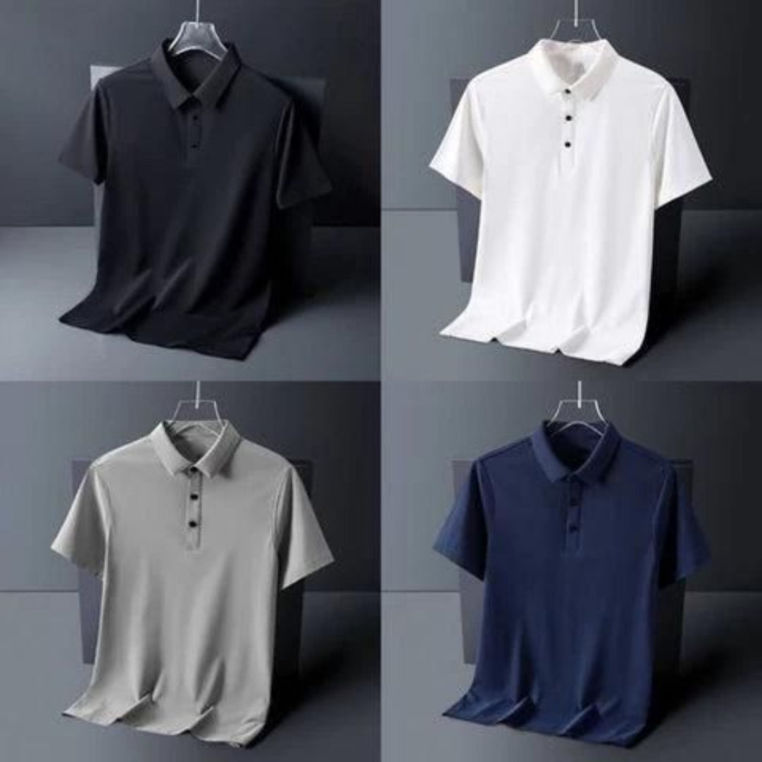 Four polo shirts in black, white, gray, and blue on hangers against a dark background.