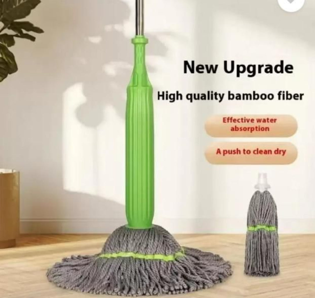 Green mop with gray bamboo fiber head on a wooden floor, with text highlighting features.