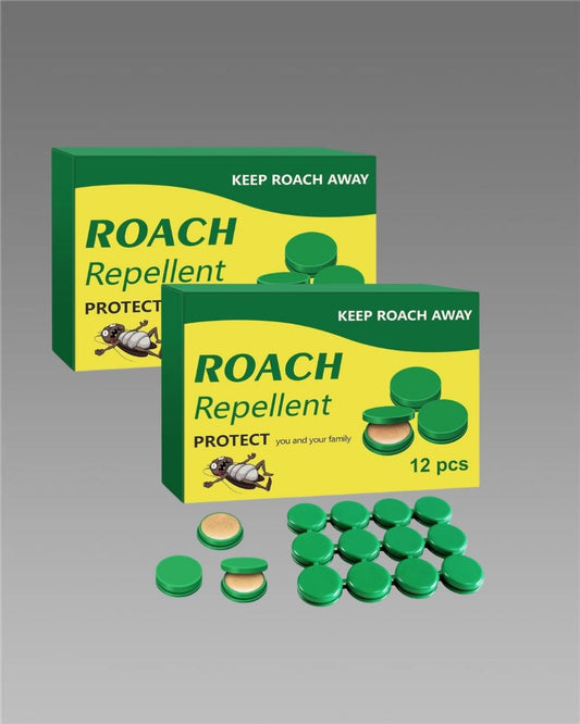 Two boxes of roach repellent with green capsules on a gray background