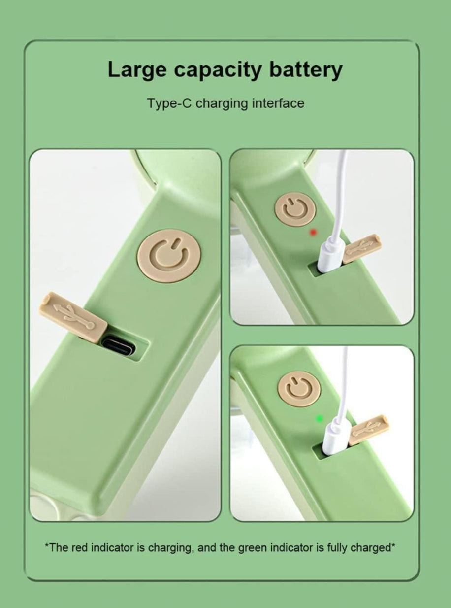Green electronic device with charging interface and battery indicator on a green background
