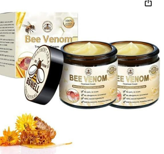 Two jars of Bee Venom cream with packaging and honeycomb on a white background