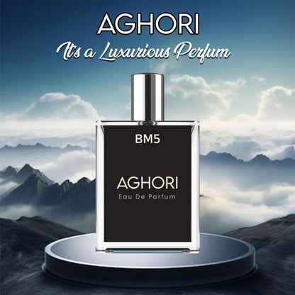 Aghori perfume bottle with mountainous landscape in the background