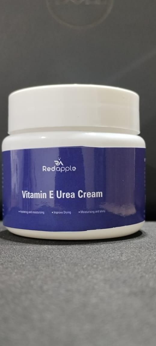 Jar of Vitamin E Urea Cream with Redapple branding on a gray background