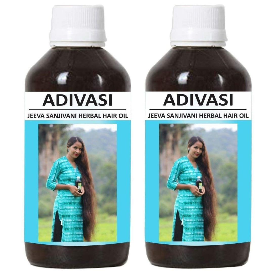 Two bottles of Adivasi Jeeva Sanjivani Herbal Hair Oil with a woman holding oil on labels.