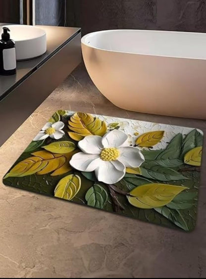 Decorative bath mat with floral design on a bathroom floor.