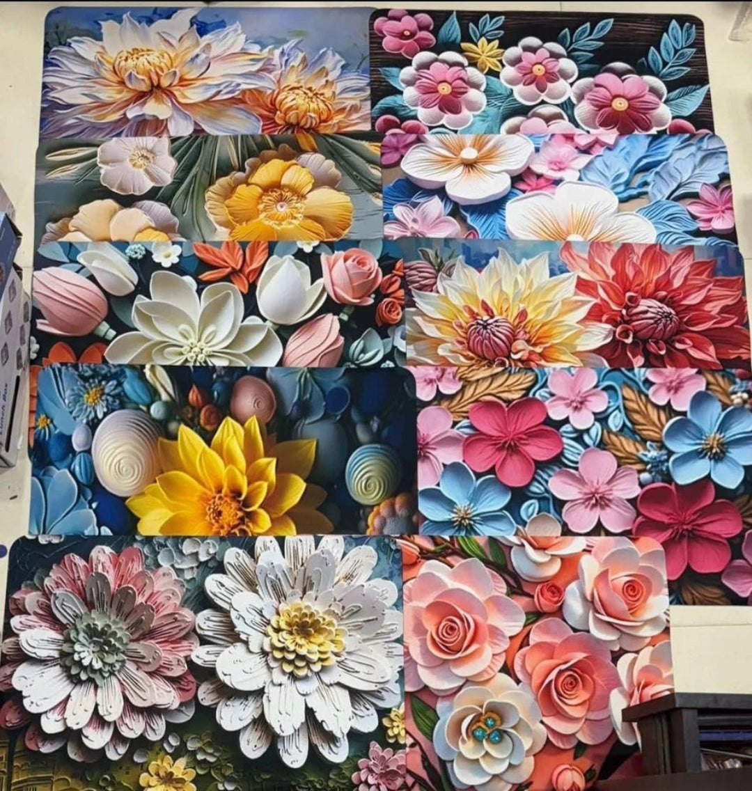 Collage of colorful 3D floral arrangements on a textured surface.