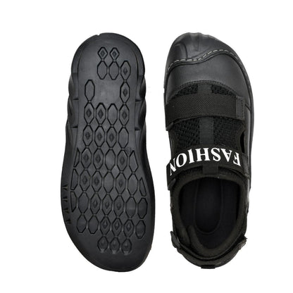 Black sandal with 'Fashion' branding on a white background
