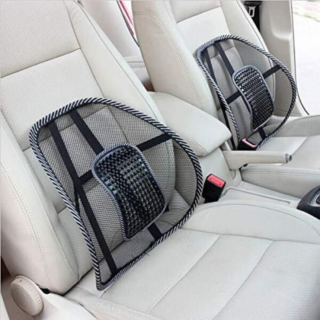 Two car seat back massagers on a white car interior