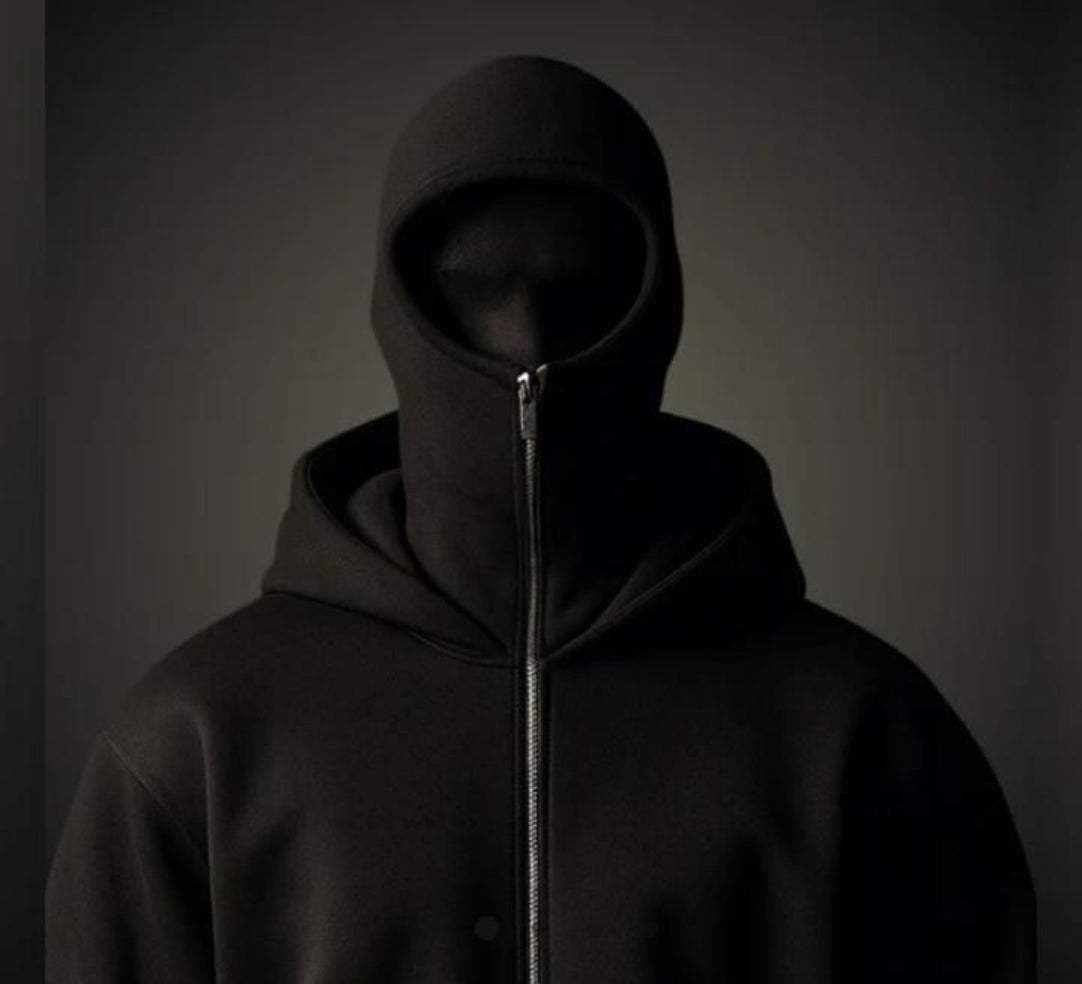 Dark hooded jacket with zipper on a gray background