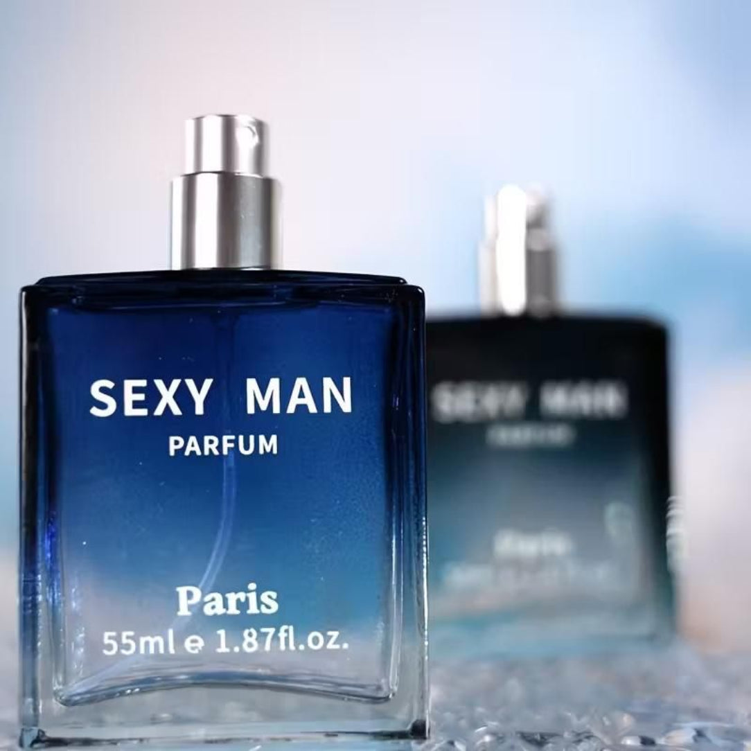 Blue perfume bottle labeled 'Sexy Man Parfum' with a blurred background